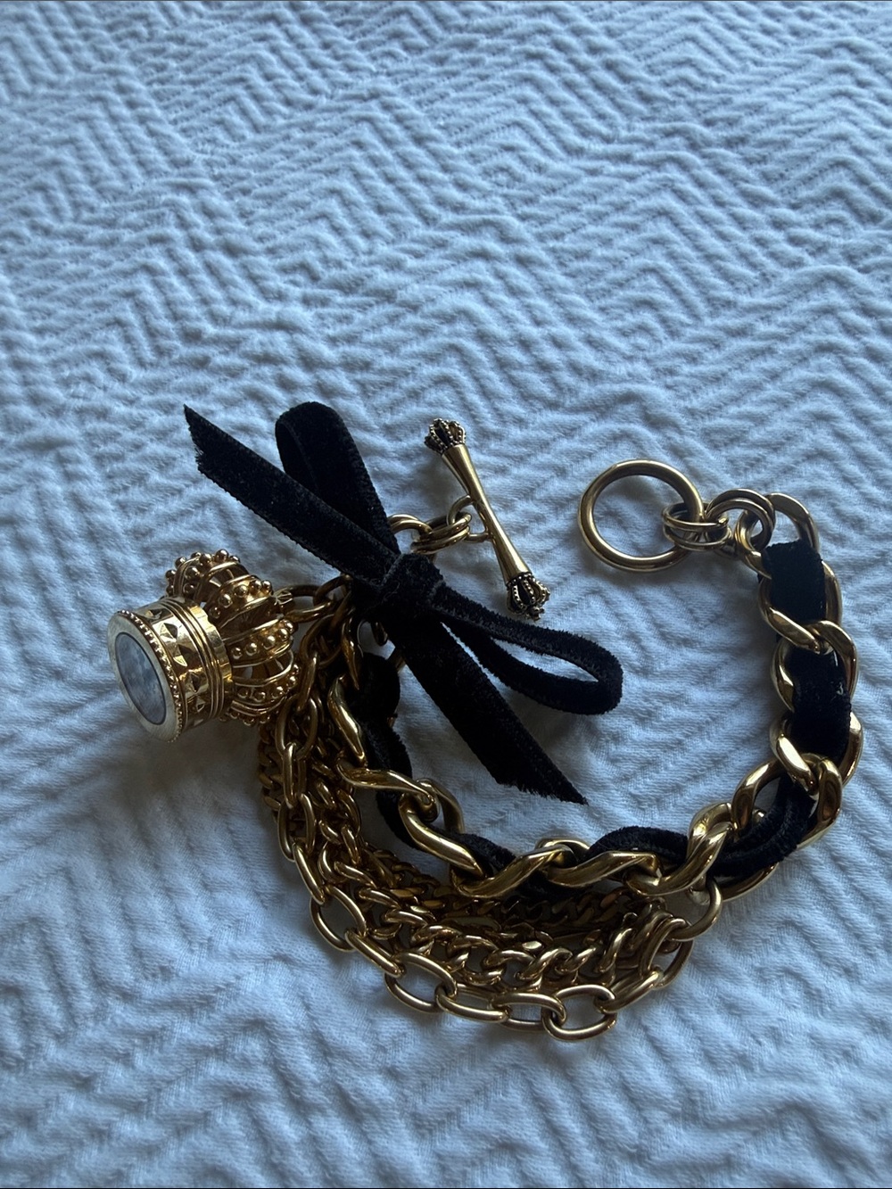 Juicy Couture Gold Tone Chain Bracelet with Black Velvet Bow